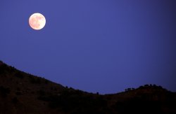 Full Moon rising over Pizarra, Spain June 2007